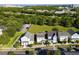 Aerial view of the community featuring houses and green spaces, showcasing its desirable location at 183 Longview Ave, Kissimmee, FL 34747