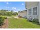 Inviting backyard featuring a dining set and two chairs, perfect for outdoor relaxation and entertaining at 183 Longview Ave, Kissimmee, FL 34747