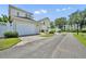 View of the driveway and garage, highlighting the property's convenient parking and storage at 183 Longview Ave, Kissimmee, FL 34747