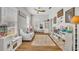 Cozy living room with neutral tones, wood floors, and ample natural light at 183 Longview Ave, Kissimmee, FL 34747