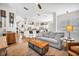 Comfortable living room with a casual rug, modern ceiling fan, and open layout to kitchen at 183 Longview Ave, Kissimmee, FL 34747