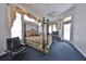 Spacious main bedroom featuring a canopy bed, large windows, and ensuite bathroom at 204 Quail Trail Ct, Lake Mary, FL 32746