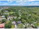 Property shown in a tranquil, wooded neighborhood, from above, with a home marker on the property at 235 Ruth Blvd, Longwood, FL 32750