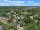 Property shown in a tranquil, wooded neighborhood, from above, with a home marker on the property at 235 Ruth Blvd, Longwood, FL 32750