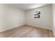 Bright bedroom featuring wood-look floors and a window that provides natural light at 235 Ruth Blvd, Longwood, FL 32750