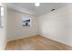 Bedroom featuring wood floors, neutral walls, and one window for natural light at 235 Ruth Blvd, Longwood, FL 32750