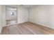 Bedroom featuring wood floors, neutral walls, and closet with mirrored sliding doors at 235 Ruth Blvd, Longwood, FL 32750