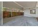 The covered parking area has a well-maintained concrete floor and a fenced yard at 235 Ruth Blvd, Longwood, FL 32750