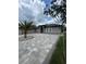 Charming home featuring a new paver driveway leading to the front entrance at 2420 Graham Dr, Orlando, FL 32807
