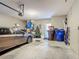 Spacious garage with car, ample storage, and a functional layout at 2530 The Oaks Blvd, Kissimmee, FL 34746