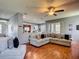 Stylish living room showcasing an open layout, hardwood floors, and neutral décor at 2530 The Oaks Blvd, Kissimmee, FL 34746