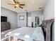 Main bedroom features grey walls, carpeted floors, and a ceiling fan at 2530 The Oaks Blvd, Kissimmee, FL 34746