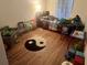 Bedroom with wood laminate floors and good natural light at 2770 Club Cortile Cir # A, Kissimmee, FL 34746