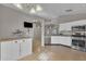 Modern kitchen with stainless steel appliances, ample cabinet space, and open layout at 3196 Verbena Ct, Deltona, FL 32725