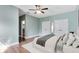 Bedroom features sleek hardwood floors, muted walls, and white trim detail throughout at 3201 Dallas Blvd, Orlando, FL 32833