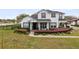 Charming two-story home with landscaped yard and elegant monochrome color palette at 3201 Dallas Blvd, Orlando, FL 32833