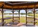 Interior view of gazebo next to the lake with 2 benches and countertop at 3201 Dallas Blvd, Orlando, FL 32833