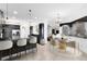 Open kitchen and dinette area with granite countertops and stainless steel appliances at 3201 Dallas Blvd, Orlando, FL 32833