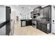 Well-equipped kitchen featuring granite countertops and modern stainless-steel appliances at 3201 Dallas Blvd, Orlando, FL 32833