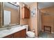 Cozy bathroom with updated vanity, ample lighting, and beach-themed decor at 3271 Settlers Trl, St Cloud, FL 34772