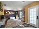 A cozy living room features hardwood floors, neutral paint colors, and lots of space at 3271 Settlers Trl, St Cloud, FL 34772