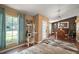Cozy living room and dining area with an area for your cat with hardwood floors, and natural light at 3271 Settlers Trl, St Cloud, FL 34772
