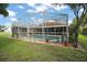 Enclosed backyard swimming pool and patio area for outdoor enjoyment at 3271 Settlers Trl, St Cloud, FL 34772