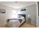 This bedroom offers soft natural light with a comfortable bed and stylish decor at 331 Bridgewater Dr, Davenport, FL 33897