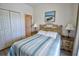 Bedroom with a closet, artwork, and hard floors at 331 Bridgewater Dr, Davenport, FL 33897