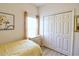 This bedroom has a closet with double doors, providing ample storage space at 331 Bridgewater Dr, Davenport, FL 33897