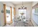Breakfast nook with access to the patio and pool at 331 Bridgewater Dr, Davenport, FL 33897