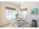 Cozy breakfast nook with natural light, modern decor, and seating for six at 331 Bridgewater Dr, Davenport, FL 33897