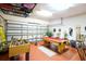 Spacious garage features a foosball table, pool table, and storage racks at 331 Bridgewater Dr, Davenport, FL 33897
