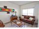 Cozy living room featuring comfortable seating, stylish decor, and plenty of natural light at 331 Bridgewater Dr, Davenport, FL 33897