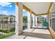 Overlook from covered balcony showing community with seating and exterior pillars at 3757 Conroy Rd # 2525, Orlando, FL 32839