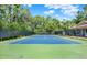 Enjoy a game on this well-maintained community tennis court surrounded by lush greenery at 3757 Conroy Rd # 2525, Orlando, FL 32839