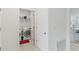 Clean laundry area with modern machines adjacent to a well-appointed kitchen at 3817 Heartleaf Ln, Mount Dora, FL 32757