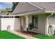 Charming exterior shot of a well-maintained home, featuring a welcoming front door, neat landscaping, and a cozy, inviting ambiance at 4438 Pinebark Ave # 4, Orlando, FL 32811