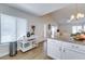 Eat-in kitchen boasts ample sunlight, granite counters, and easy access to the living area at 4438 Pinebark Ave # 4, Orlando, FL 32811
