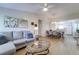 Open-concept living room flows seamlessly into the dining area and offers abundant light at 4438 Pinebark Ave # 4, Orlando, FL 32811