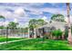 Great pool area with a fence and a view of the clubhouse at 4438 Pinebark Ave # 4, Orlando, FL 32811