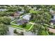 Aerial view of the property highlighting the spacious fenced backyard, lush greenery, and neighborhood layout at 4825 Waterwitch Point Dr, Orlando, FL 32806