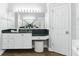 Bathroom showcasing a vanity with granite countertops and a walk-in shower at 4825 Waterwitch Point Dr, Orlando, FL 32806