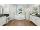 Bathroom features a large soaking tub, walk-in shower, and dual vanity at 4825 Waterwitch Point Dr, Orlando, FL 32806