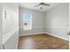 Cozy bedroom with hardwood floors, offering a comfortable and inviting space at 4825 Waterwitch Point Dr, Orlando, FL 32806