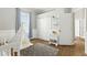 Adorable Bedroom with hardwood flooring, features a decorative tent and closet storage at 4825 Waterwitch Point Dr, Orlando, FL 32806