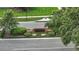 Well-maintained Waterworth Cove entrance sign surrounded by lush greenery and landscaping at 4825 Waterwitch Point Dr, Orlando, FL 32806
