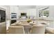 Bright kitchen with a large island featuring granite countertops and seating, perfect for entertaining at 4825 Waterwitch Point Dr, Orlando, FL 32806