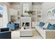 Comfortable living room featuring a fireplace, custom built-ins, and stylish decor at 4825 Waterwitch Point Dr, Orlando, FL 32806