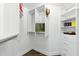 Bright walk-in closet with custom shelving and ample storage space, providing a functional and organized area at 4825 Waterwitch Point Dr, Orlando, FL 32806